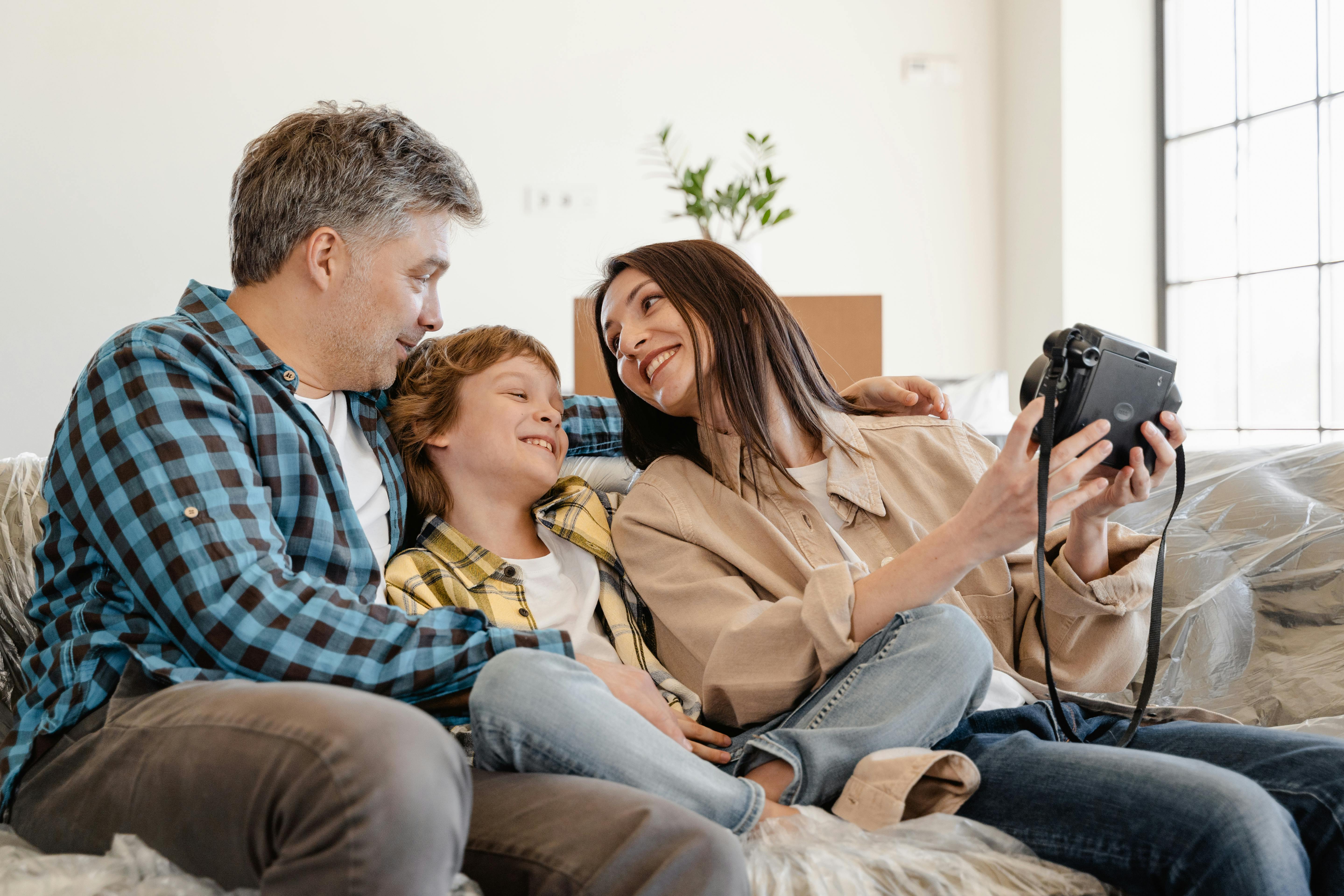 family sitting on couch